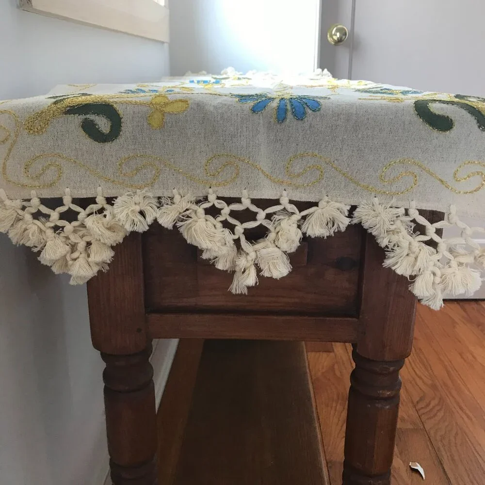 Decorative Turkish table runner with vibrant floral design.
